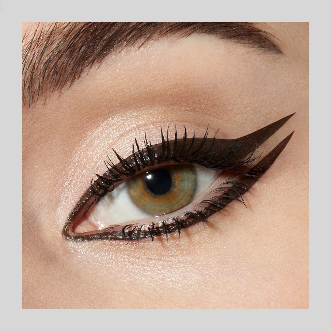Lancôme Official - Transform your eyes in a single swipe with Artliner. An easy to apply felt tip liquid eyeliner for clean and precise application. Pictured here: Artliner in Bois de Rose and availab...